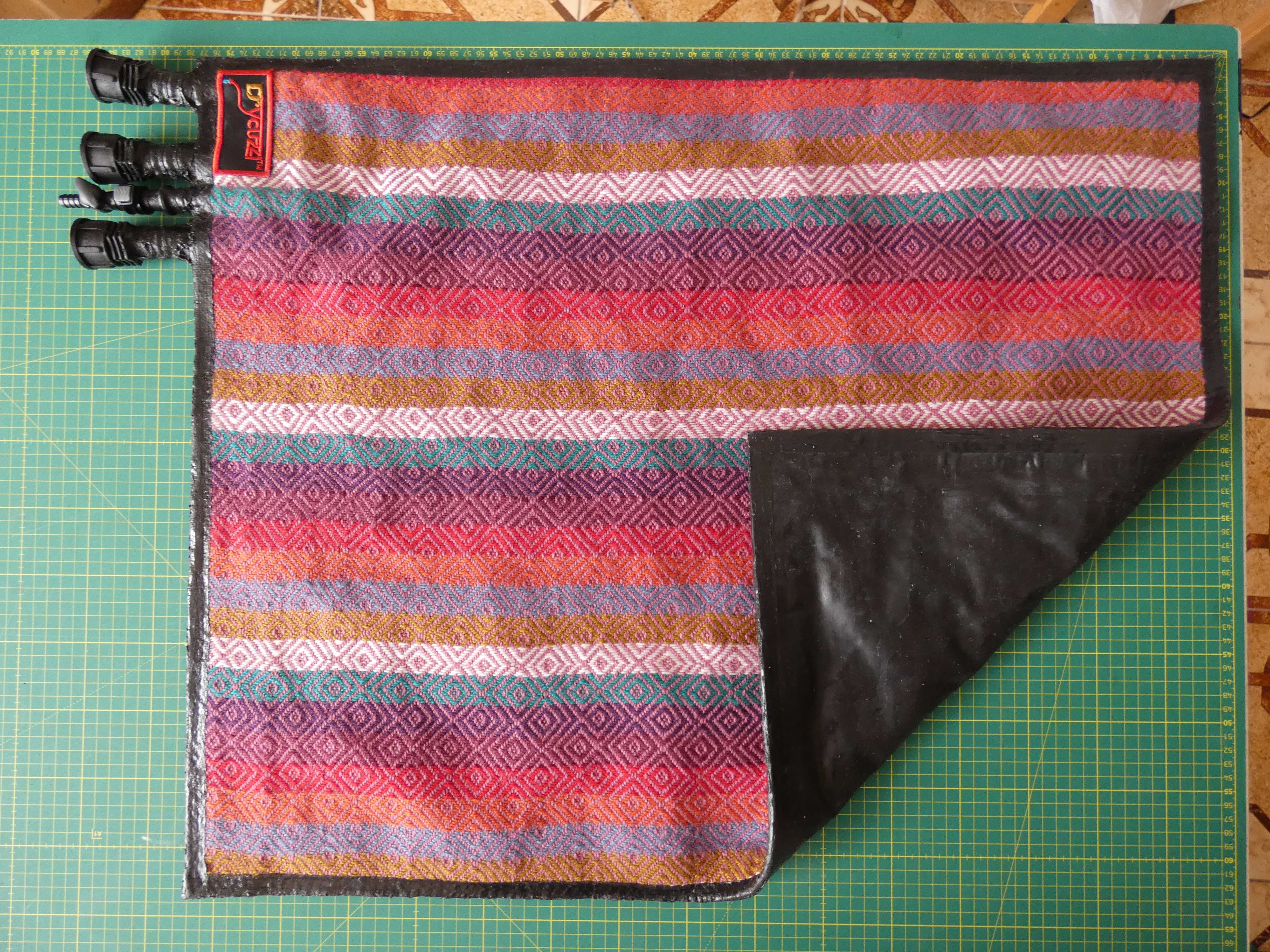 Drycuzzi comfort fabric top layer with water inlet ports